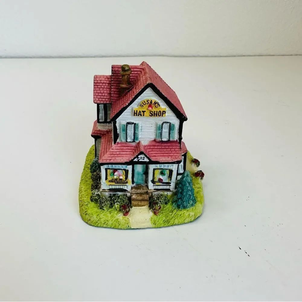 International Resourcing Liberty Falls Susan’s Hat Shop House Figurine AH127
